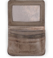 A brown leather Jeor wallet with an open compartment by Bed Stu.