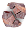 A pair of Bed Stu Jessie women's brown wedge sandals.