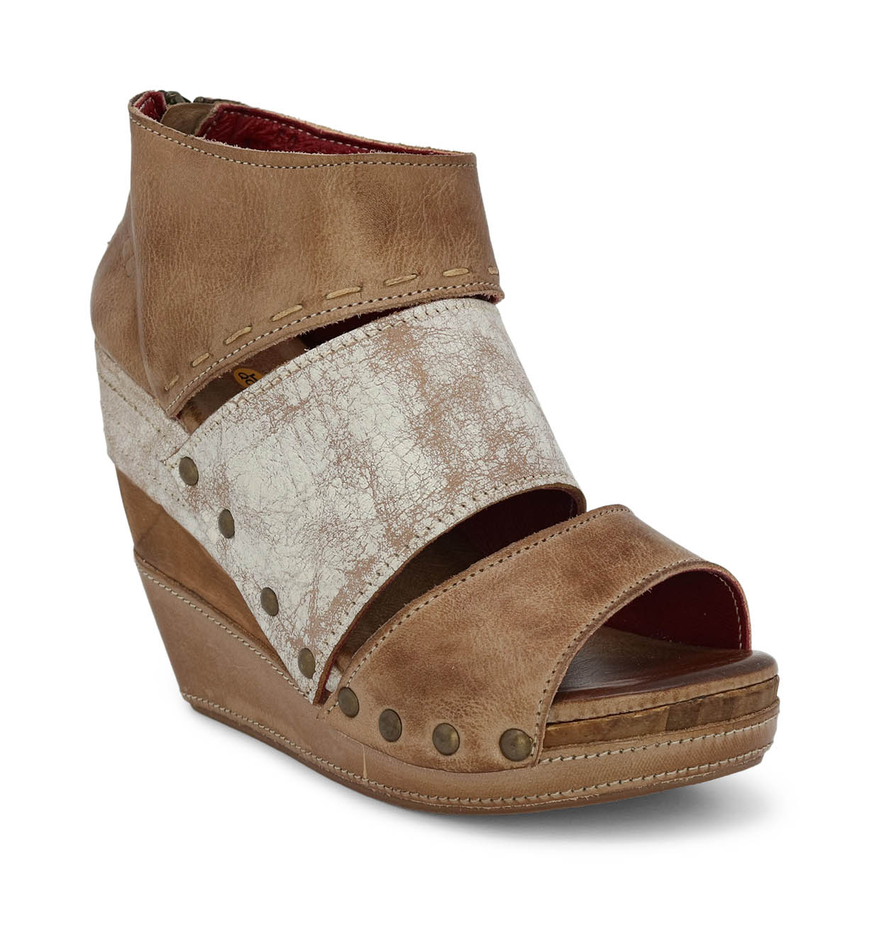 A women's Jessie wedge sandal with tan and white straps by Bed Stu.
