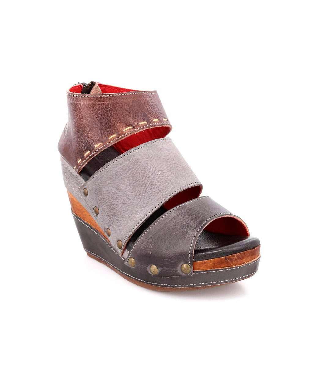 A women's grey wedge sandal with straps and a heel called Jessie by Bed Stu.
