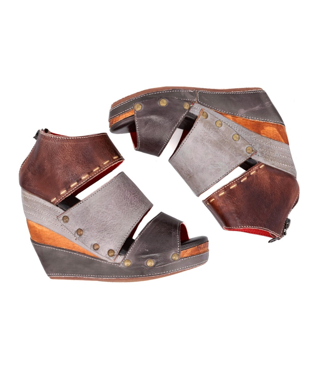 A pair of brown and grey Bed Stu wedge sandals named Jessie.