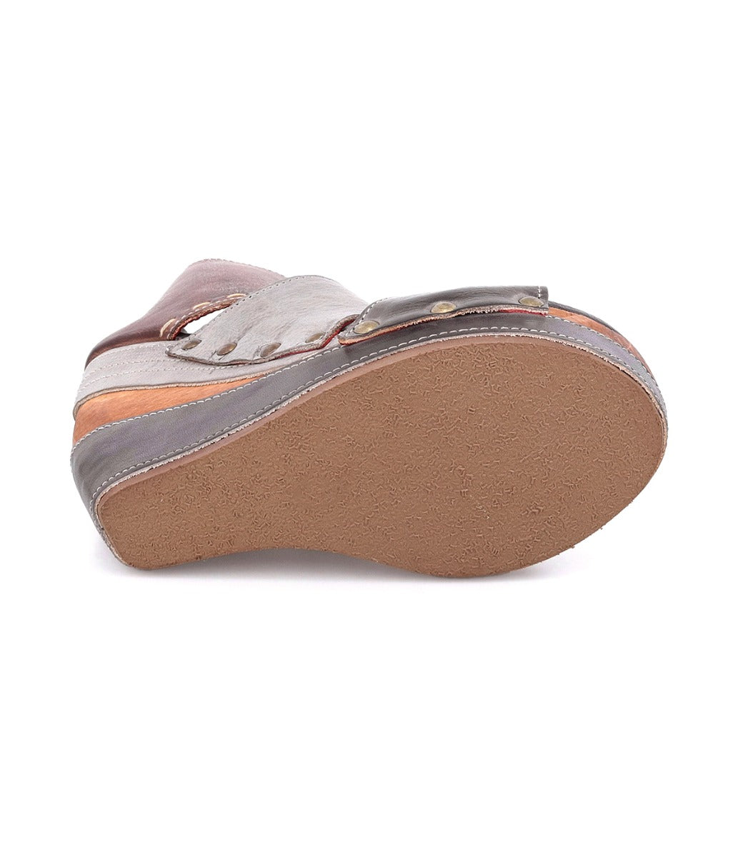 A pair of Bed Stu Jessie women's shoes with a buckle on the side.