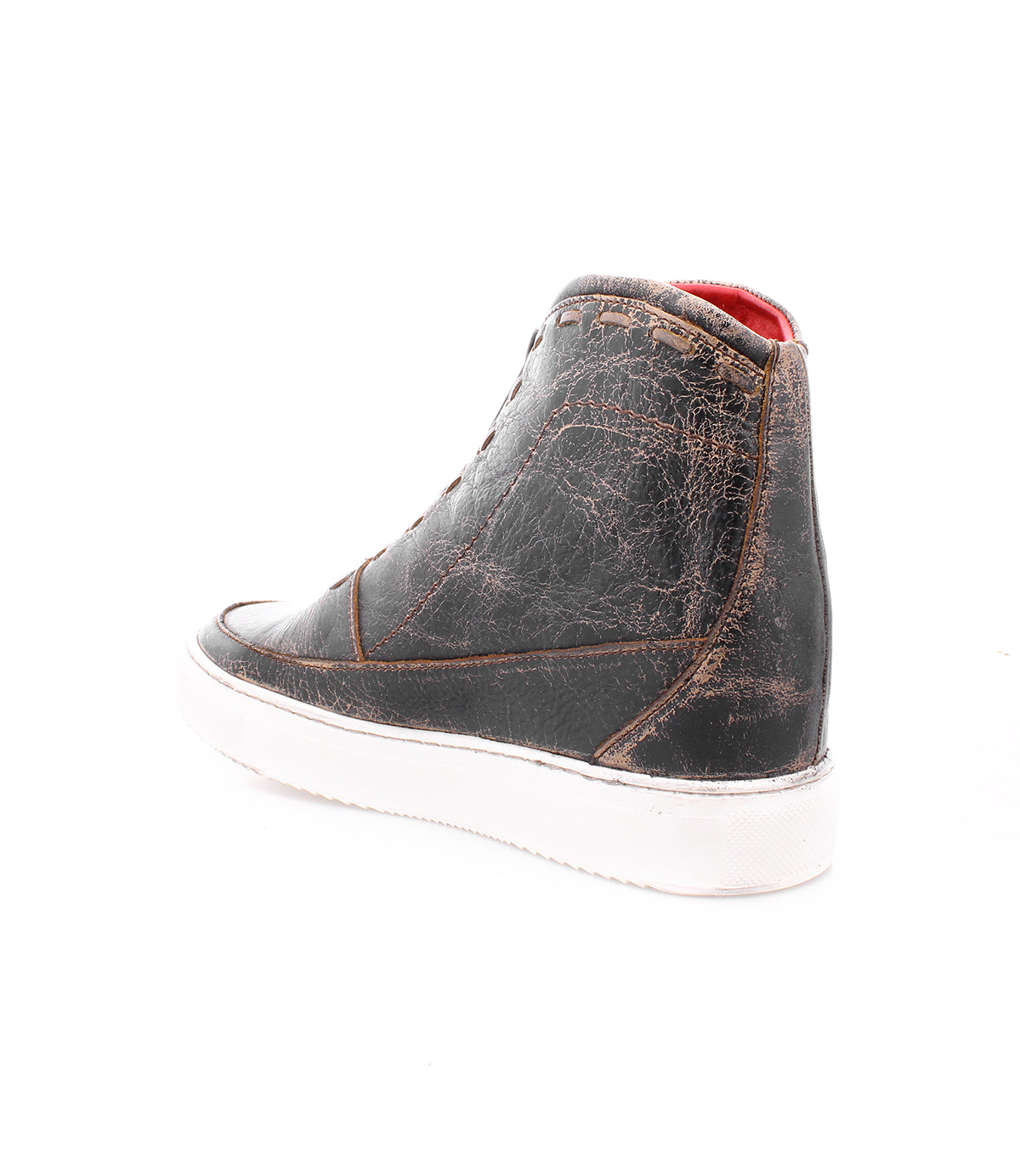 A comfortable black and white leather sneaker with a red sole, the Joyce by Bed Stu.