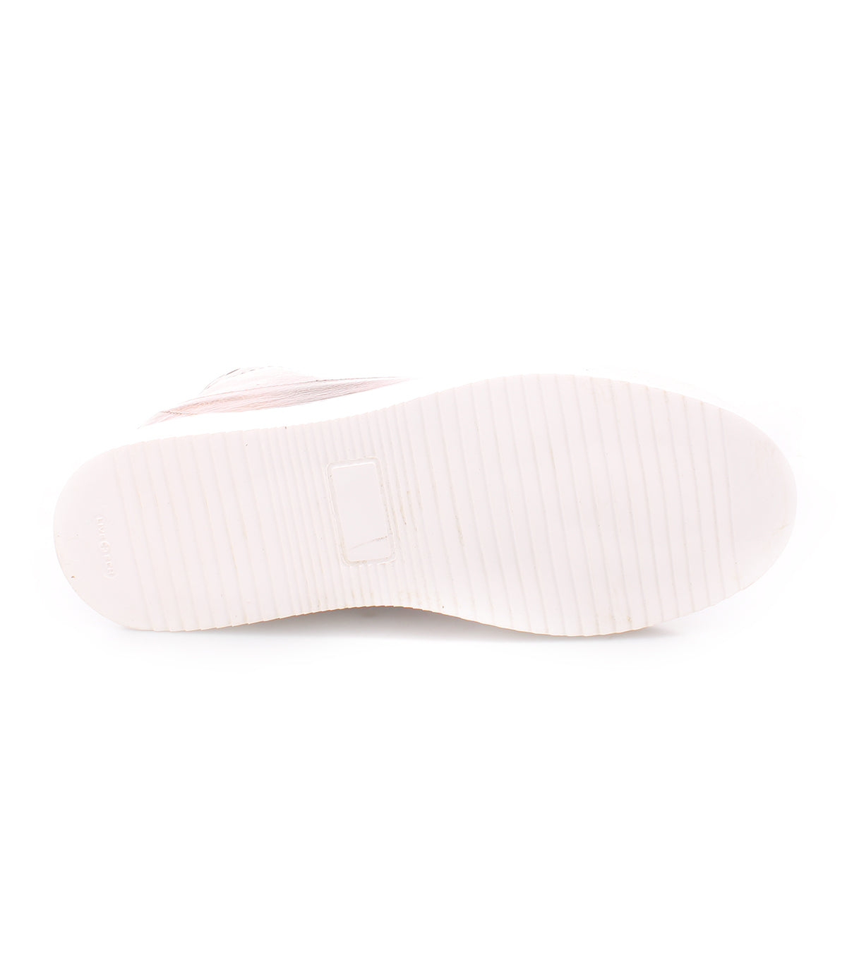 A comfortable white Joyce sneaker with pink soles on a convenient white surface from Bed Stu.