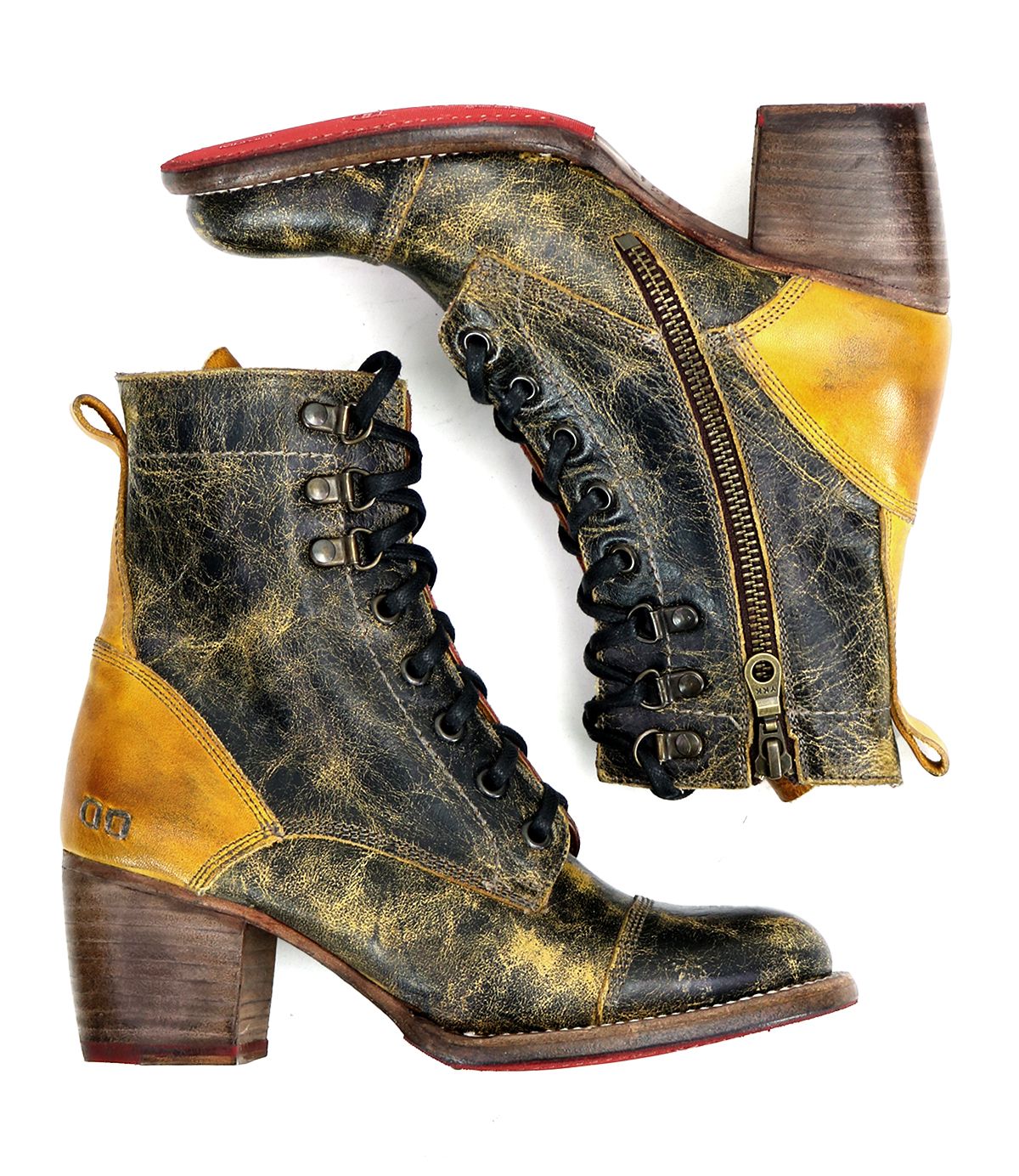 A pair of worn Bed Stu Judgement boots, featuring a black and yellow color scheme, 8-eye lace-up design, side zippers, wooden heels, and cushioned insoles, photographed against a white background.