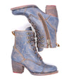 A pair of Bed Stu Judgement women's blue leather boots.