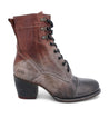A women's ankle boot in grey and brown, the Judgement by Bed Stu.