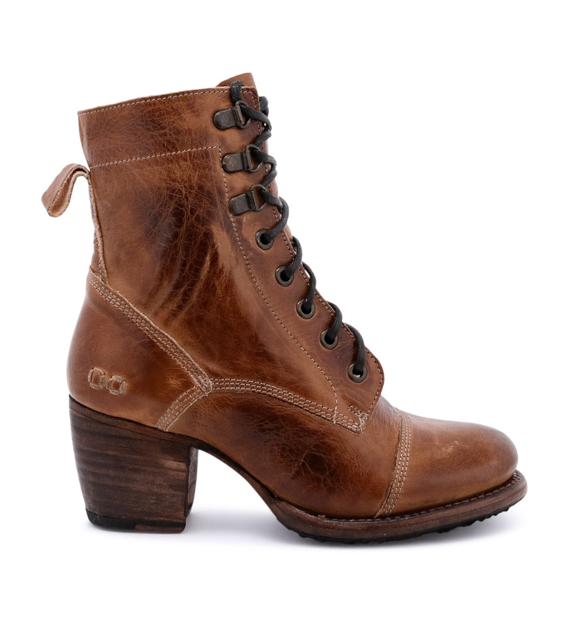 The Bed|Stü Judgement boot is a brown leather lace-up style featuring a stacked block heel, cap toe, visible stitching, and a pull tab at the back, shown in a side view against a white background.