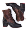 A pair of Bed Stu Judgement women's brown and black leather boots.