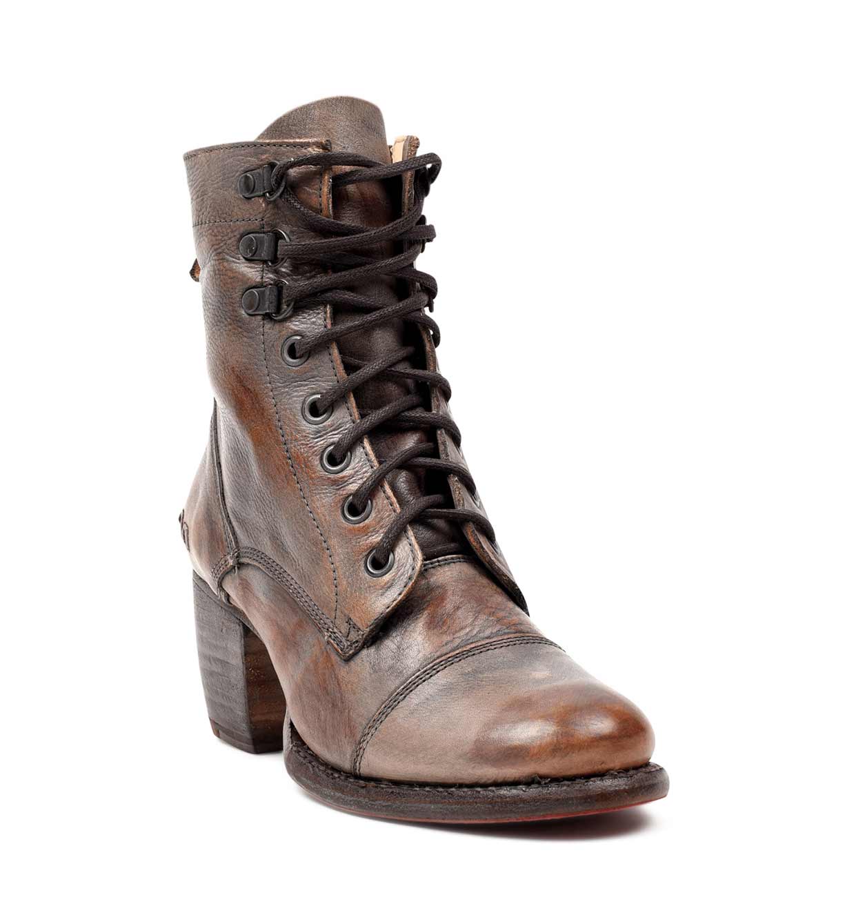 A women's brown leather boot with laces called Judgement by Bed Stu.