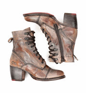 A pair of Bed Stu Judgement women's brown leather boots on a white background.
