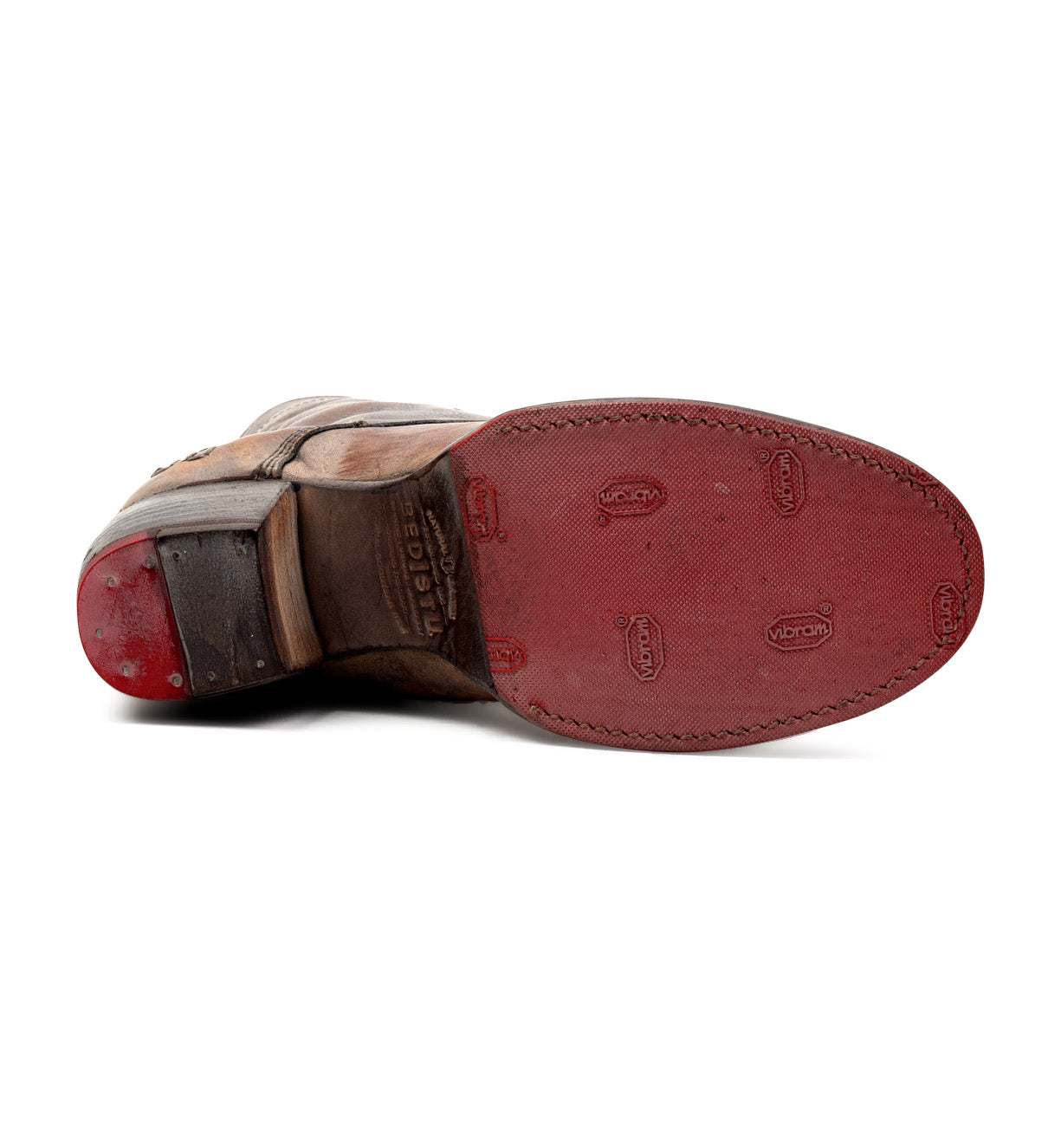 A pair of Bed Stu Judgement shoes with red soles on a white background.