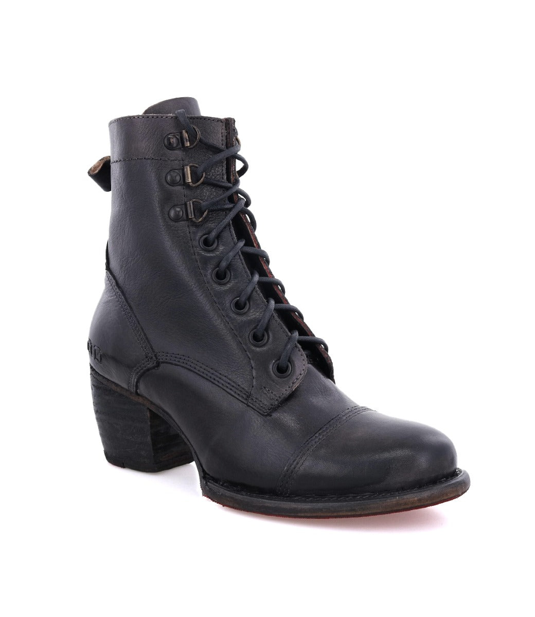 A women's black leather ankle boot called Judgement by Bed Stu.