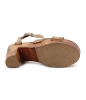 Side view of the Kalah wooden platform sandal by Bed Stu, featuring a textured rubber sole, tan straps, and an eco-conscious design crafted from sustainably sourced materials.