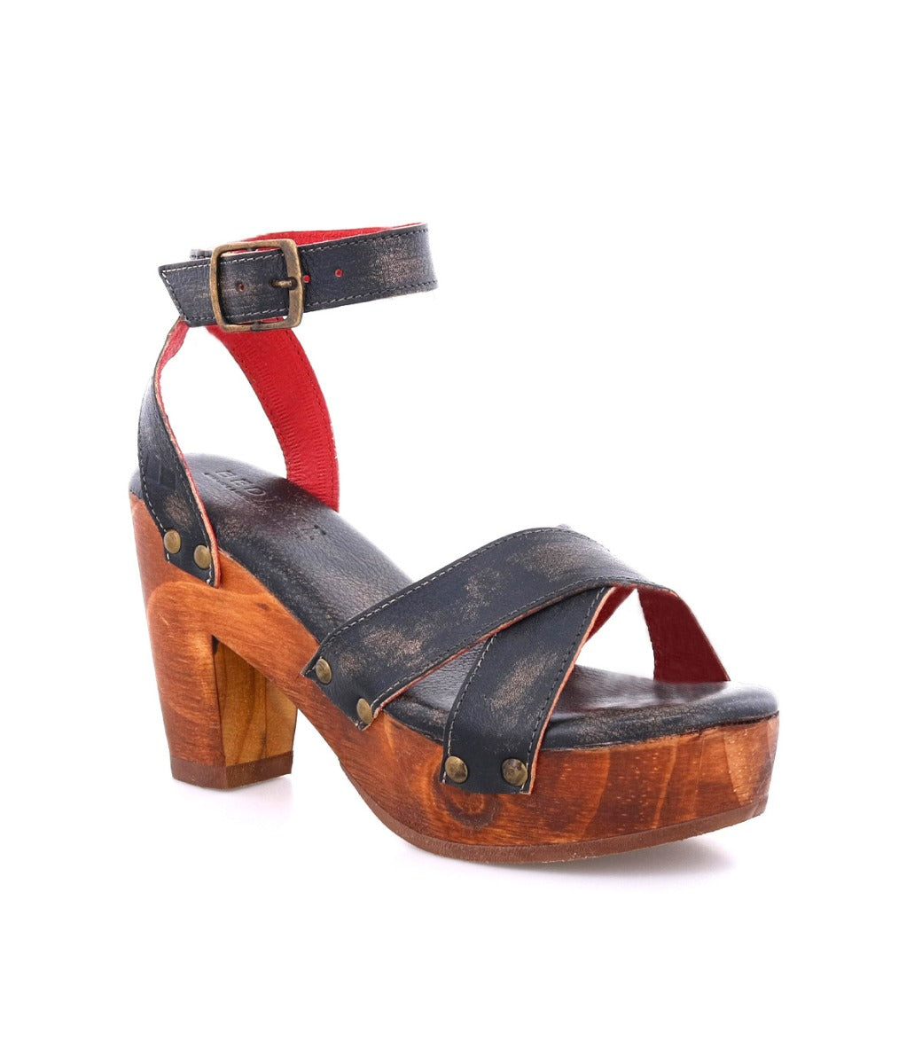 A Kalah sandal by Bed Stu, with a wooden platform and straps.