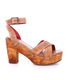 A women's Kalah sandal with a wooden heel and straps by Bed Stu.