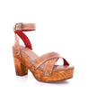 A women's Kalah sandal with straps and Bed Stu wooden heel.