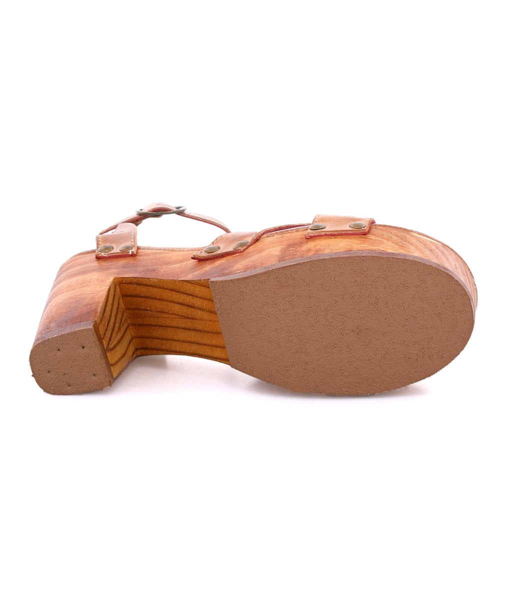 A pair of Bed Stu Kalah wooden sandals on a white background.