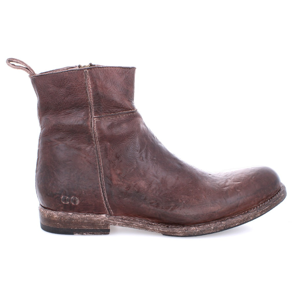 A single brown leather Kaldi ankle boot with a worn texture, viewed from the side, standing against a white background by Bed Stu.