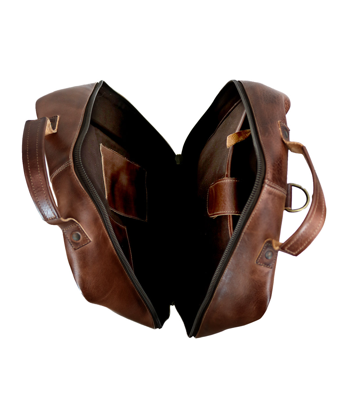 Open Kamet by Bed Stu with zipper, showcasing empty interior compartments and pockets, handcrafted from vegetable tanned leather.