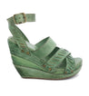 A green Kaphie wedge sandal with straps and buckles by Bed Stu.