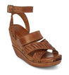 A women's tan wedge sandal with braided straps, the Kaphie from Bed Stu.