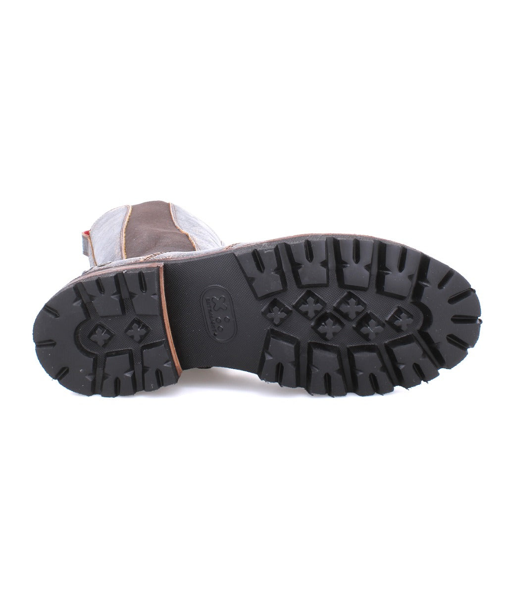 A pair of Kataleya boots by Bed Stu with black soles on a white background.