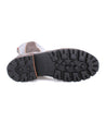 A pair of Kataleya boots by Bed Stu with black soles on a white background.