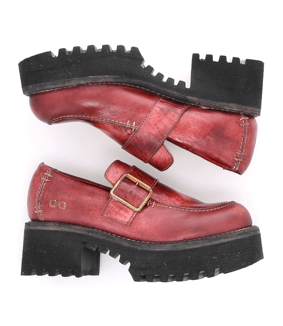 A pair of Kavi red leather loafers with black buckles, perfect for fall fashion. Brand: Bed Stu.