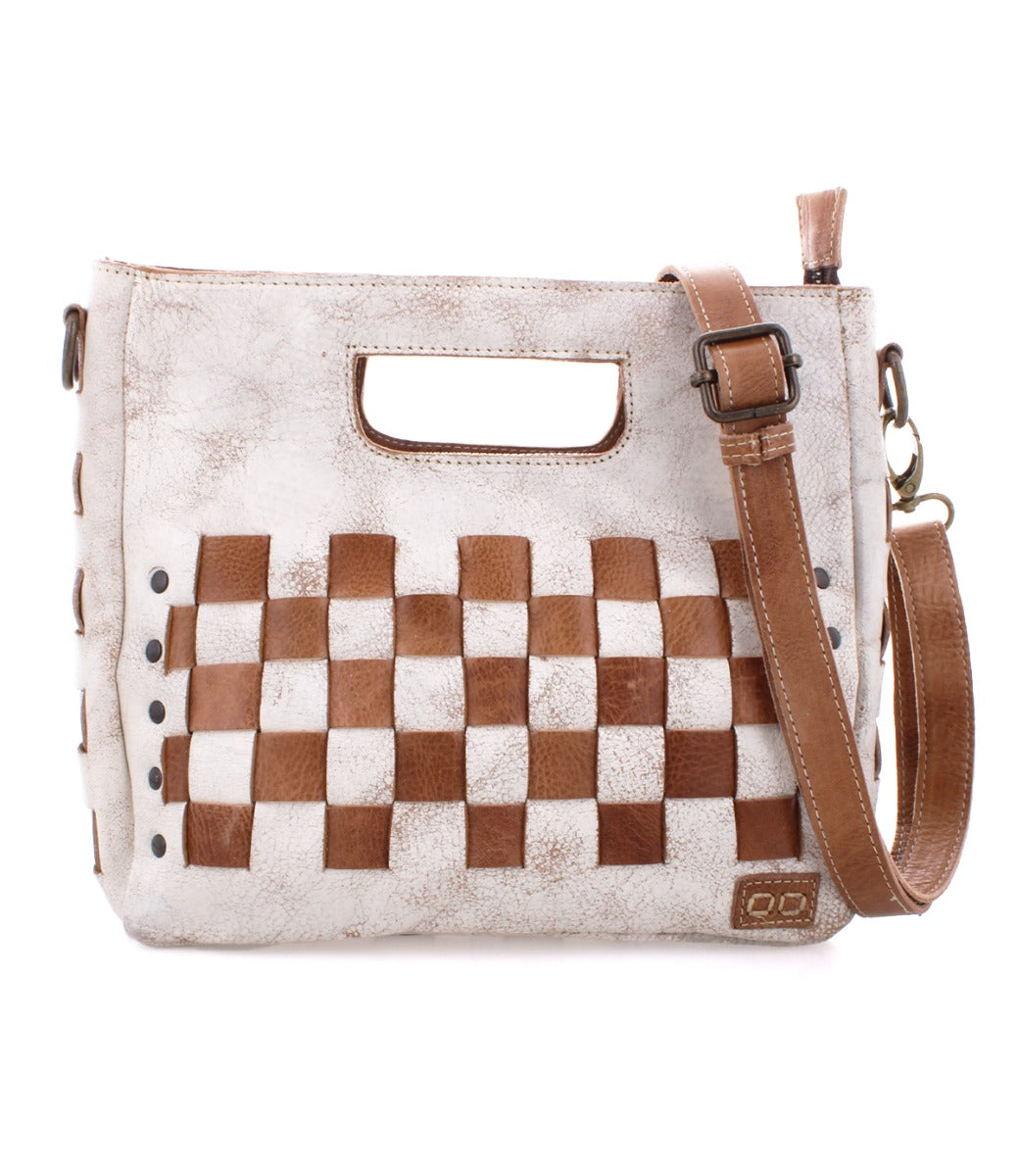 A white and tan Bed Stu Keiki bag with a checkered pattern.