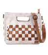 A white and tan Bed Stu Keiki bag with a checkered pattern.