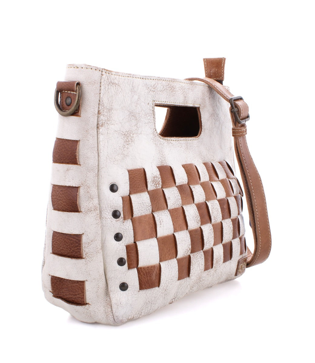 A white and brown Keiki handbag with a woven pattern from Bed Stu.