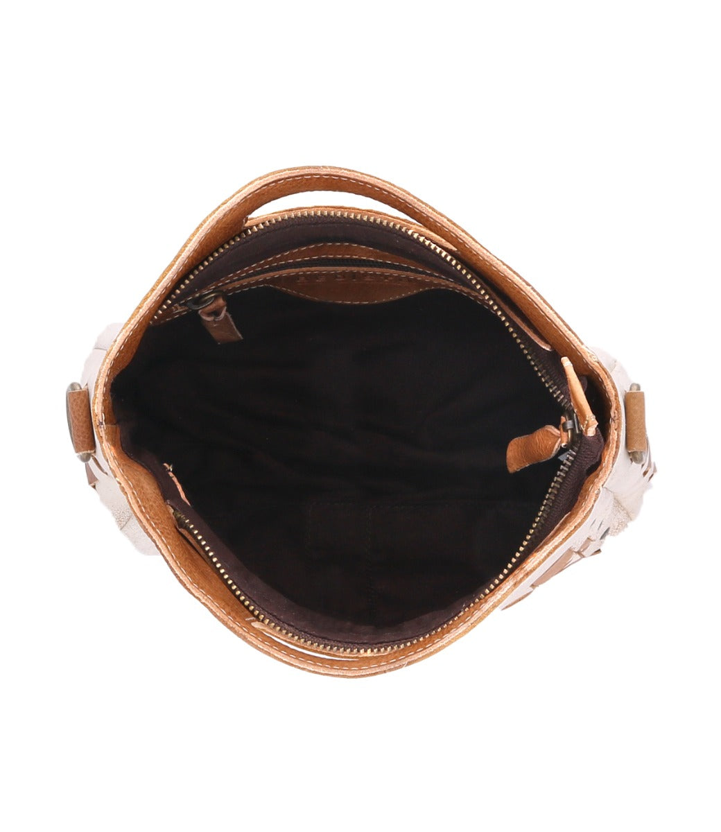 The inside of a Keiki brown leather bag by Bed Stu.