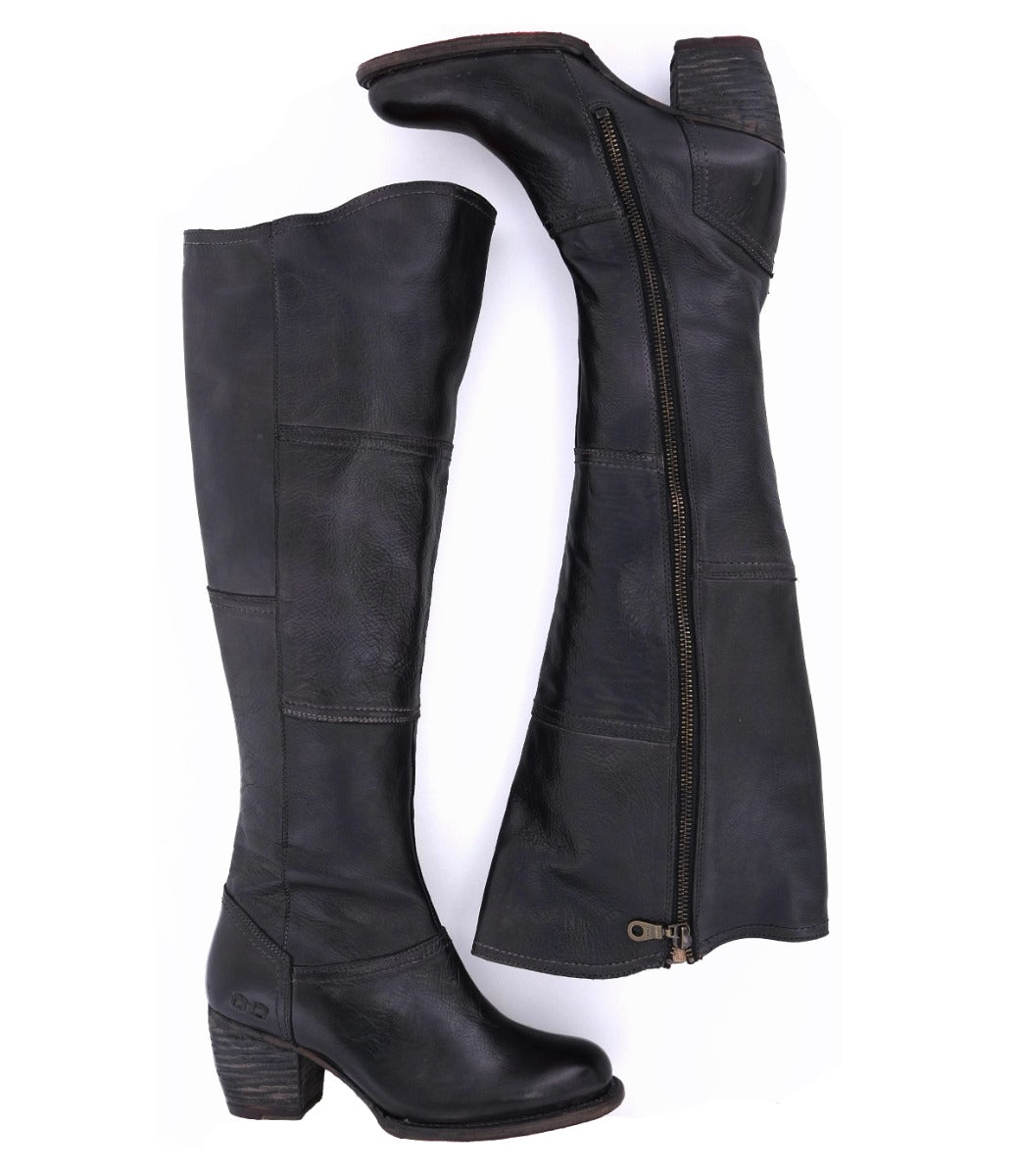 A pair of Bed Stu Kennice black leather boots with zippers on the side.