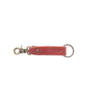 A Bed Stu Keygrab, a red leather keychain with a brass hook.