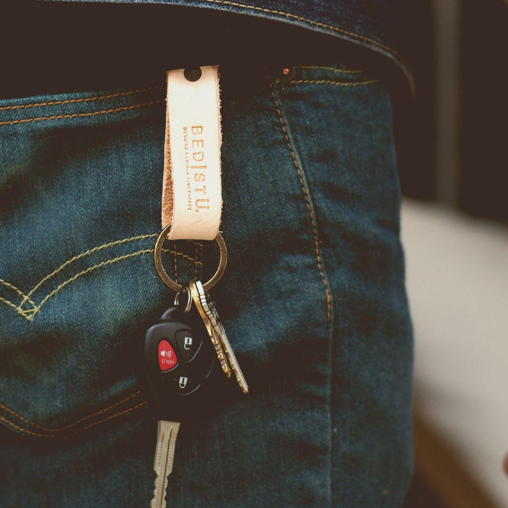 A person's jeans with a Bed Stu Keygrab.