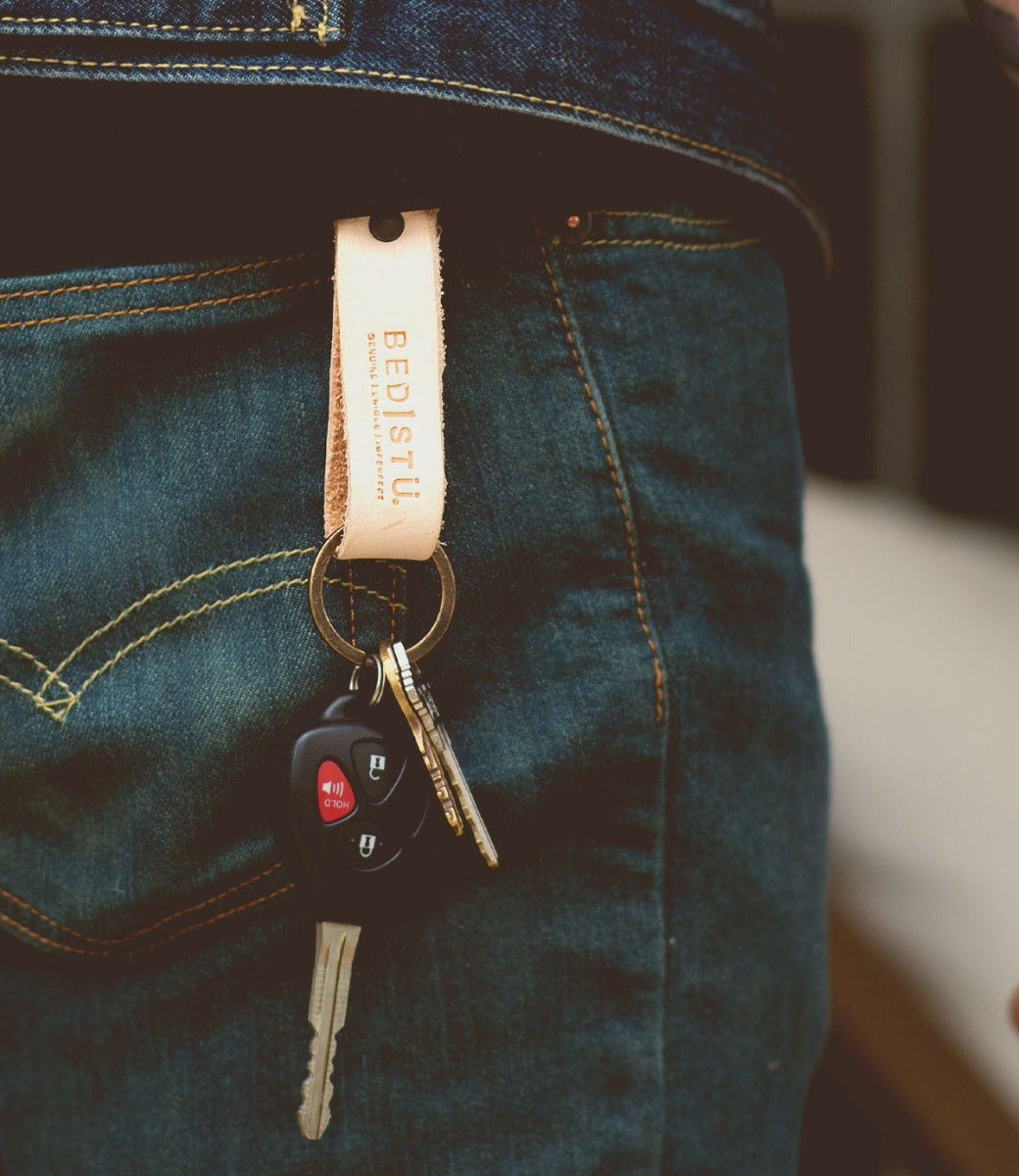 A person's jeans with a Bed Stu Keygrab.