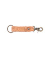 A Bed Stu Keygrab in peach with a metal clasp.