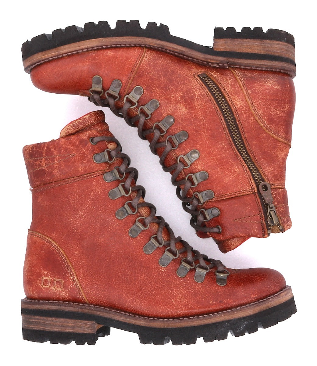 A pair of Khya boots by Bed Stu, made of red leather with brown laces.
