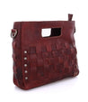 A Keiki by Bed Stu burgundy leather handbag with rivets.