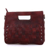 A Keiki by Bed Stu burgundy leather handbag with studded details.