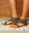 A woman wearing Bed Stu Kimberly sandals.