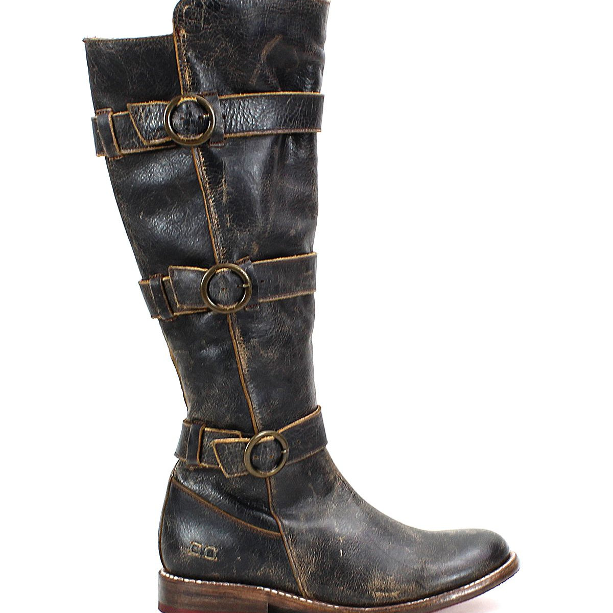 A side view of the Bed Stu Kitty boot, a black, knee-high leather design featuring four decorative adjustable straps and buckles along its length and a low wooden heel.