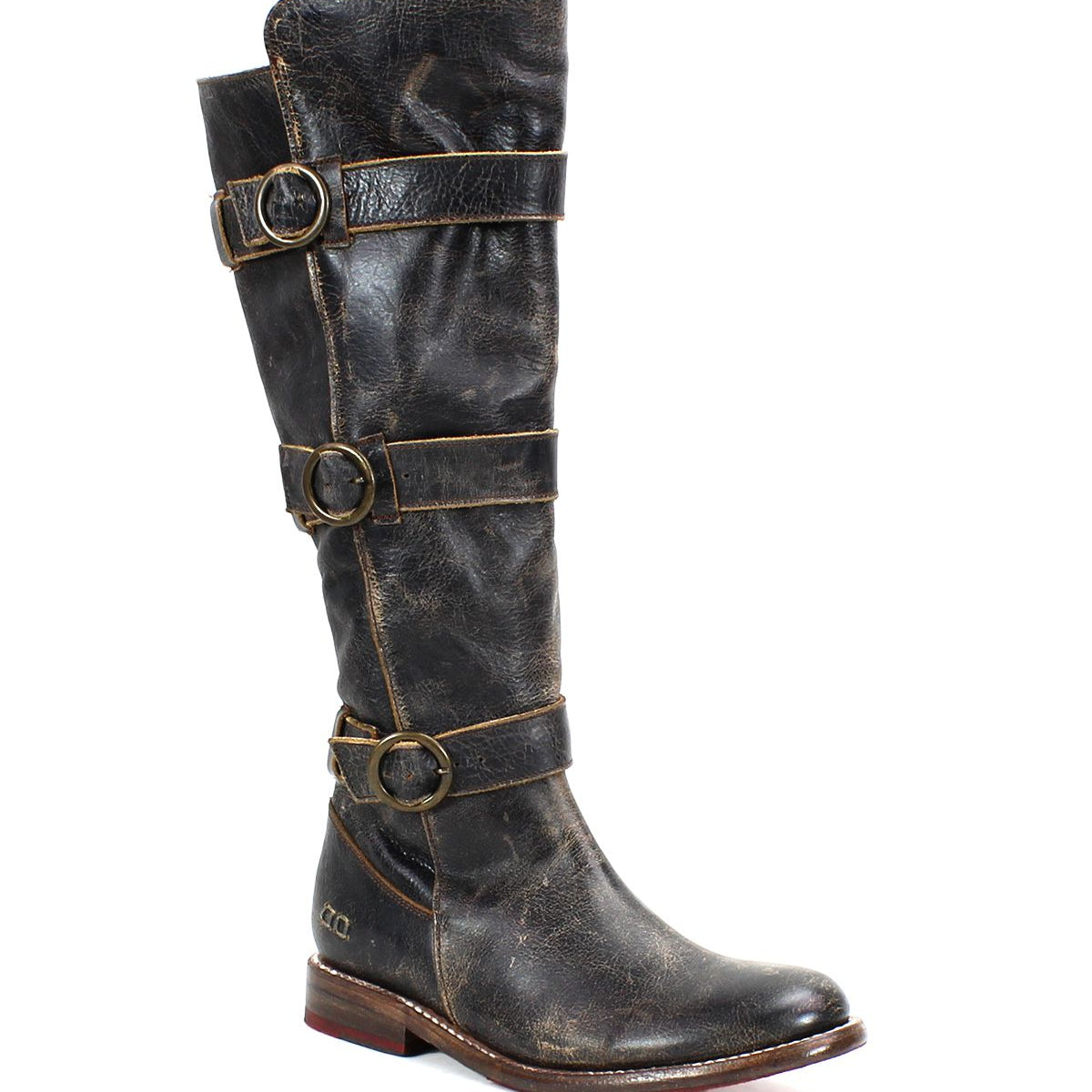 A tall beauty, the Bed Stu Kitty single worn black leather knee-high boot showcases a distressed finish with edgy sophistication, featuring three adjustable buckles for a customizable fit along the shaft and a low wooden heel.