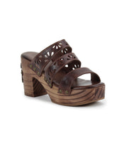 The Bed Stu Kreep is a brown platform sandal with 70s-style cutout straps, a natural wooden block heel, and brass side studs.