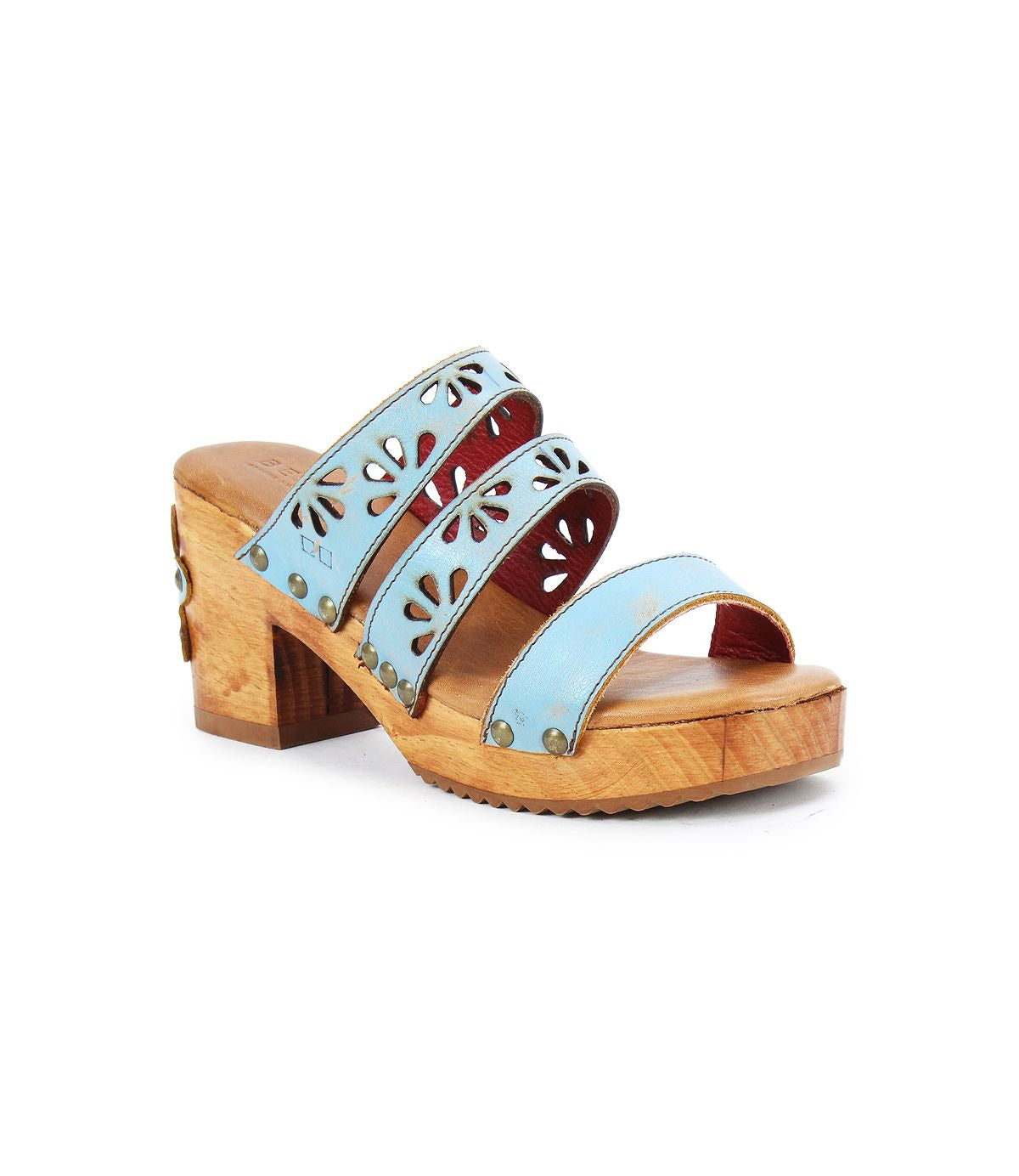 The Kreep by Bed Stu is a light blue open-toe sandal with a chunky wooden heel and 70's-inspired floral cutouts on the straps.
