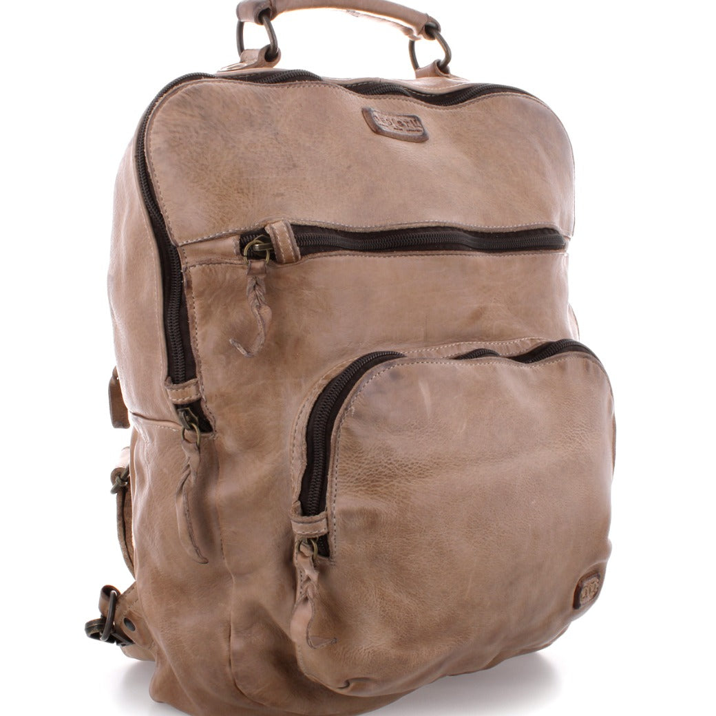 A beige leather Bed Stu Lafe backpack with zippers on the side.