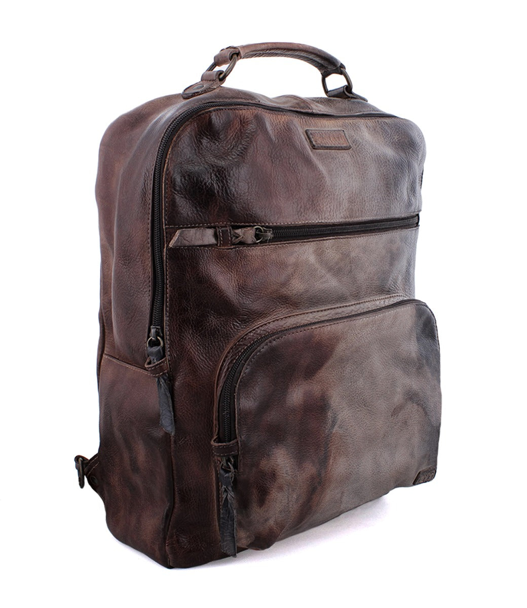 A Lafe brown leather backpack on a white background by Bed Stu.