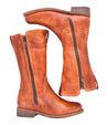 A pair of Latifah brown leather boots with zippers made by Bed Stu.