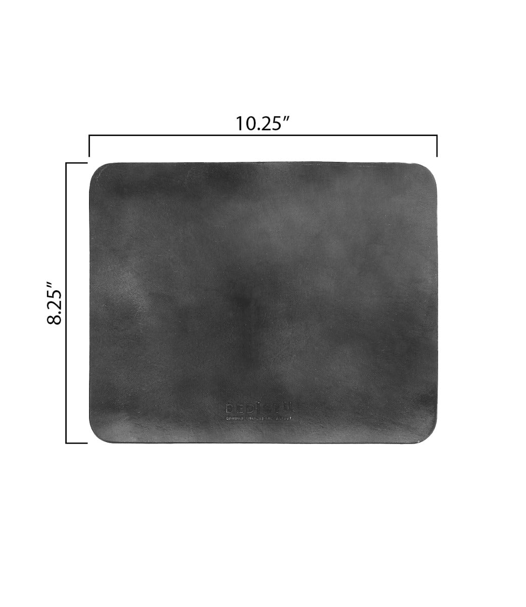 A rectangular black leather Launcher Mouse Pad with a suede underside from Bed Stu, measuring 10.25 inches by 8.25 inches, perfect for a curated workspace.